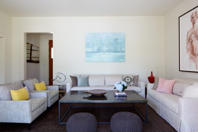 Main house living room with art collection